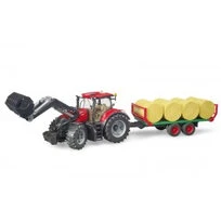 Tracteur Case IH Optum 300 CVX avec remorque et balles rondes